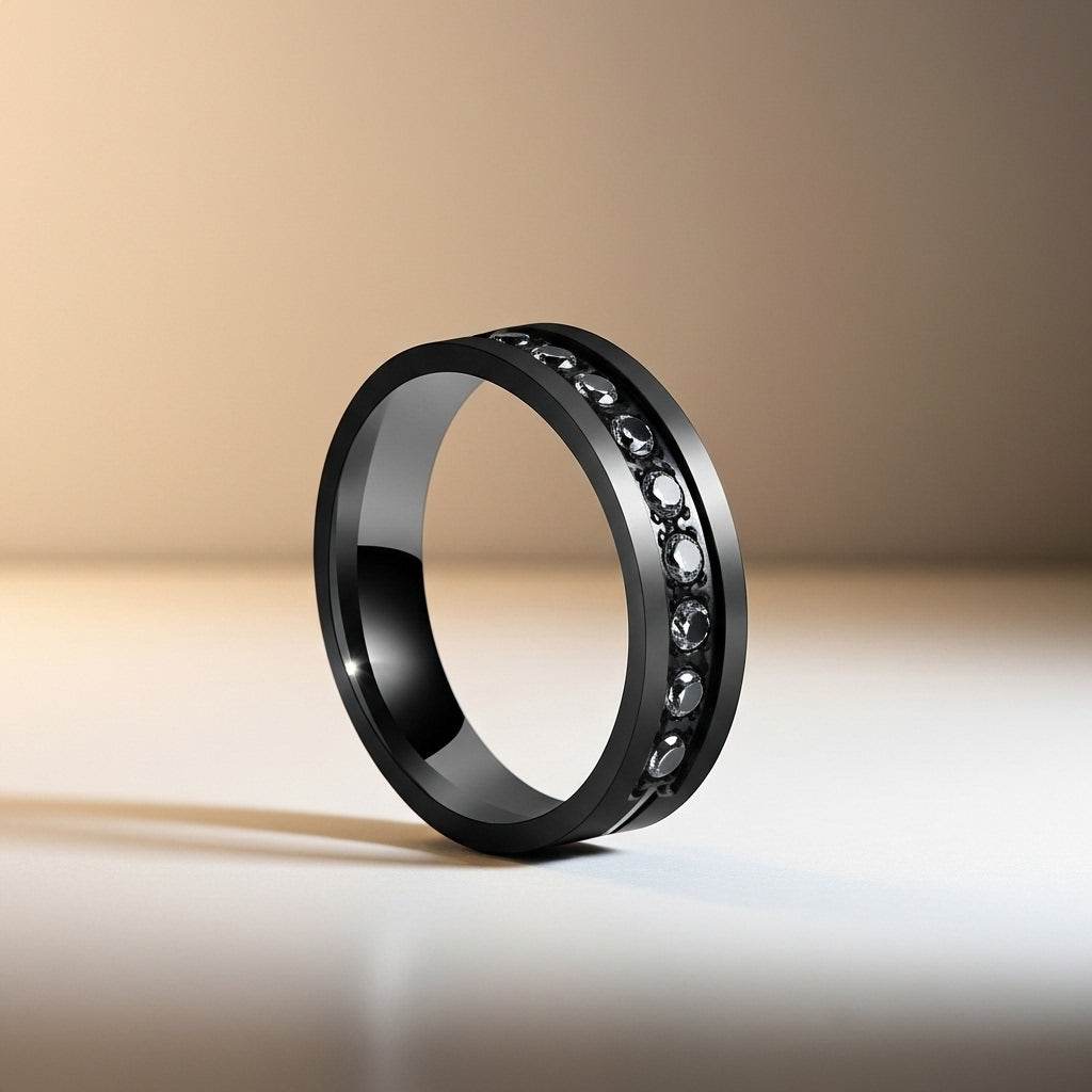 Black ring with embedded stones on a gradient background