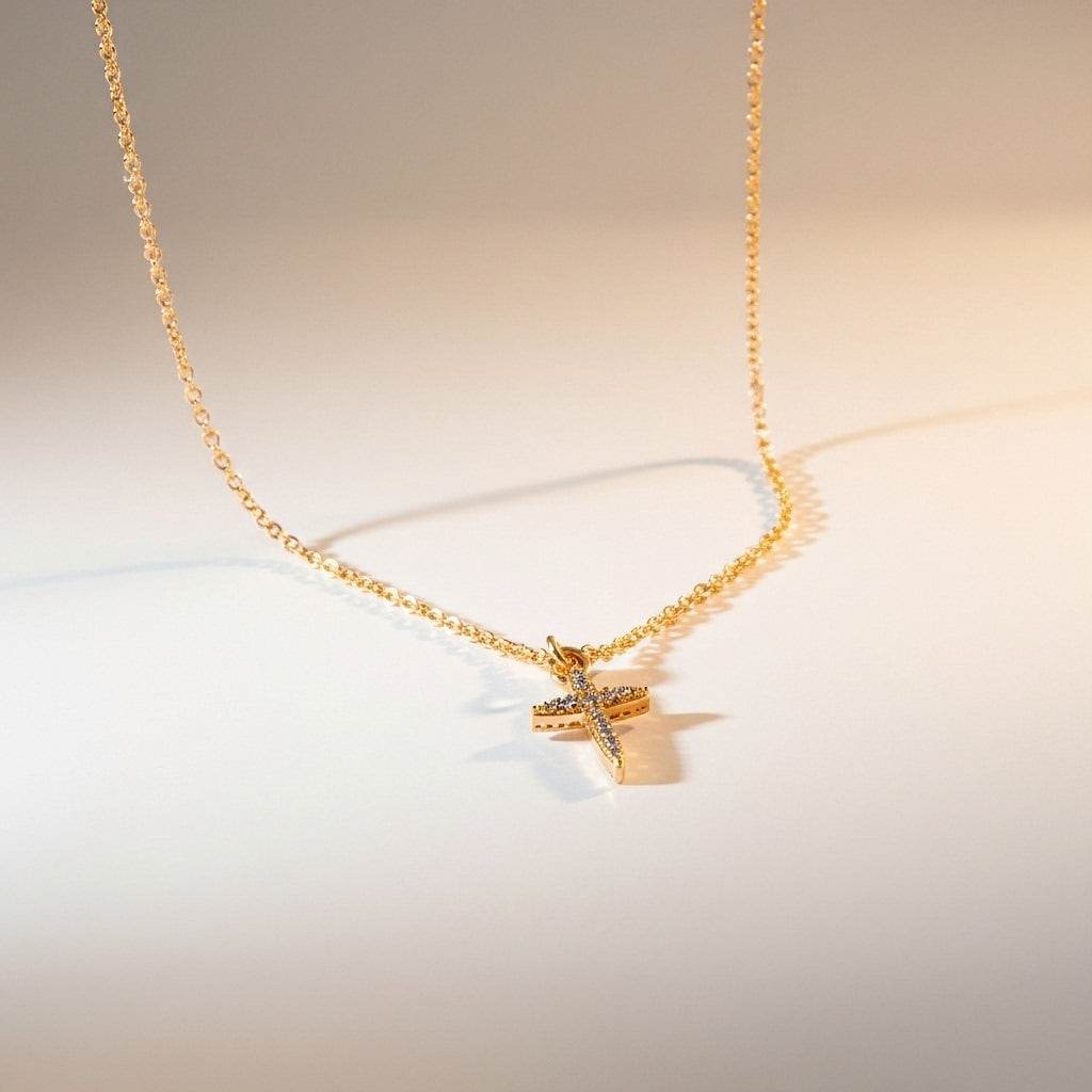 Gold necklace with a star-shaped pendant on a gradient background