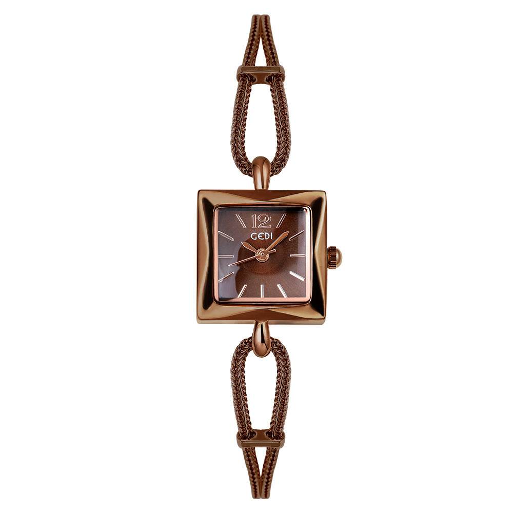 Rose gold watch with a rope-like strap on a white background